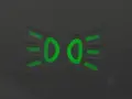 Zielony symbol świateł mijania na desce rozdzielczej.