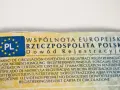 Fragment dowodu rejestracyjnego z oznaczeniem PL i tekstem w wielu językach, w tym "Dowód Rejestracyjny".