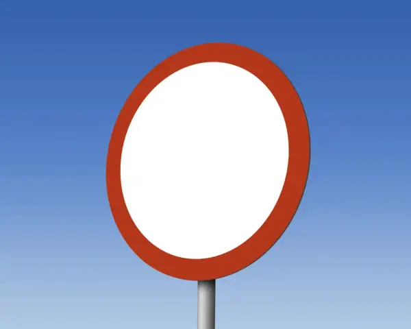 Okrągły, biały znak drogowy b1 z czerwoną obwódką na tle błękitnego nieba.